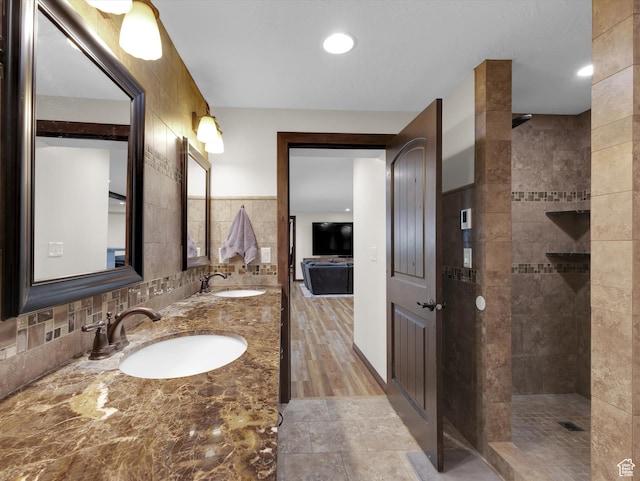 1271 E Oakridge Rd S, Park City, UT 84098 - full bath featuring double vanity, tile walls, a sink, and tiled shower