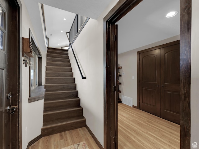 1271 E Oakridge Rd S, Park City, UT 84098 - staircase with recessed lighting, visible vents, baseboards, and wood finished floors