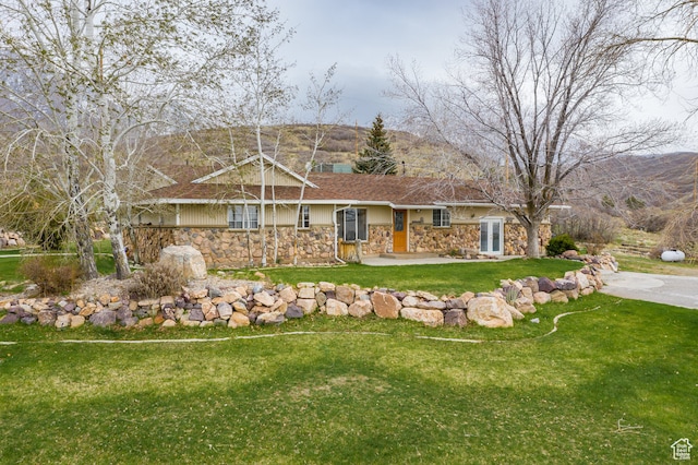 14975 S Canyon Rd, Santaquin, UT 84655 - ranch-style home featuring a patio area and a front yard