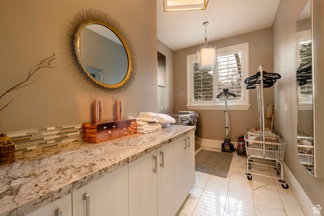 2227 E 5340 S, Holladay, UT 84117 - bathroom featuring vanity, baseboards, and marble finish floor