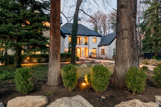 2227 E 5340 S, Holladay, UT 84117 - view of front of property featuring metal roof, a chimney, and a standing seam roof