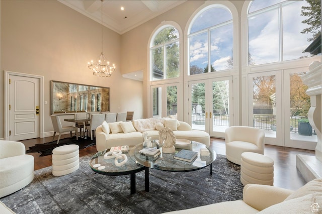 2227 E 5340 S, Holladay, UT 84117 - living area with ornamental molding, french doors, an inviting chandelier, and wood finished floors