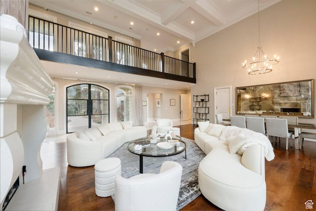 2227 E 5340 S, Holladay, UT 84117 - living room featuring beamed ceiling, an inviting chandelier, wood finished floors, and ornamental molding