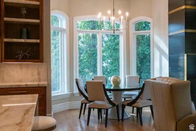 2227 E 5340 S, Holladay, UT 84117 - dining space with wood finished floors, baseboards, and a chandelier