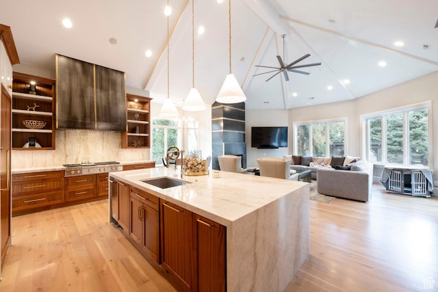 2227 E 5340 S, Holladay, UT 84117 - kitchen with open shelves, an island with sink, light wood-type flooring, and a sink