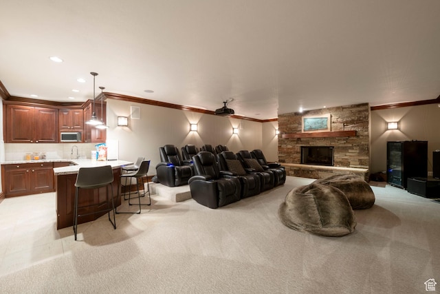2227 E 5340 S, Holladay, UT 84117 - home theater room with recessed lighting, a sink, a stone fireplace, light carpet, and crown molding