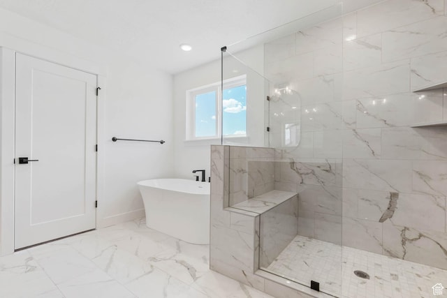 1203 Crest Dale Ln, Santaquin, UT 84655 - bathroom with baseboards, marble finish floor, a soaking tub, and a shower stall