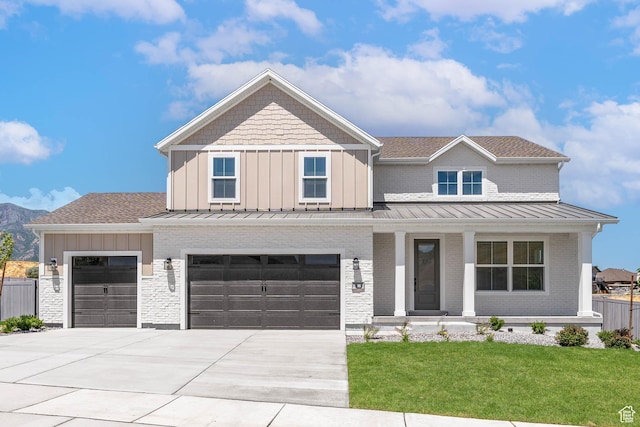 1203 Crest Dale Ln, Santaquin, UT 84655 - view of front facade featuring a standing seam roof, fence, driveway, covered porch, and brick siding
