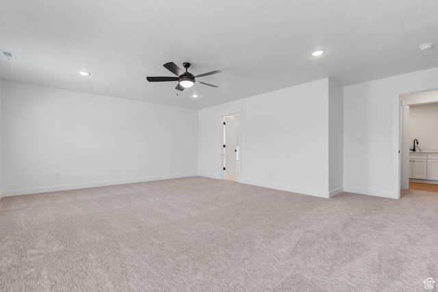 1203 Crest Dale Ln, Santaquin, UT 84655 - spare room featuring baseboards, a ceiling fan, and light carpet