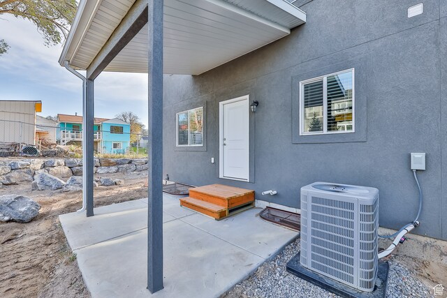 112 E 730 N Unit 102, Tooele, UT 84074 - view of patio / terrace featuring central air condition unit