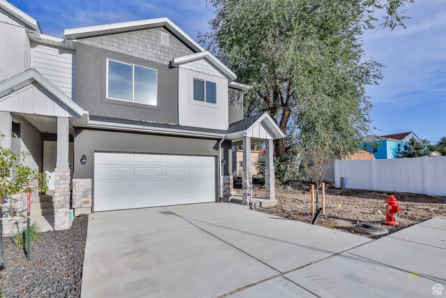 112 E 730 N Unit 102, Tooele, UT 84074 - view of front of home featuring a garage