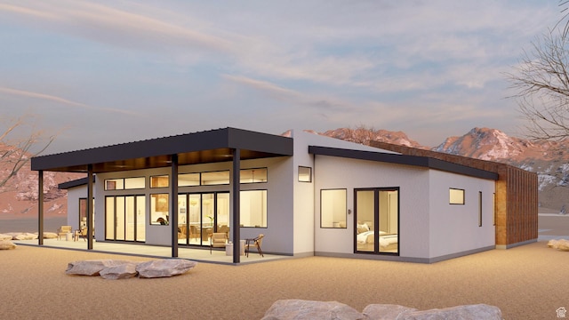 2235 Salida Del Sol, Moab, UT 84532 - back of house at dusk with a mountain view