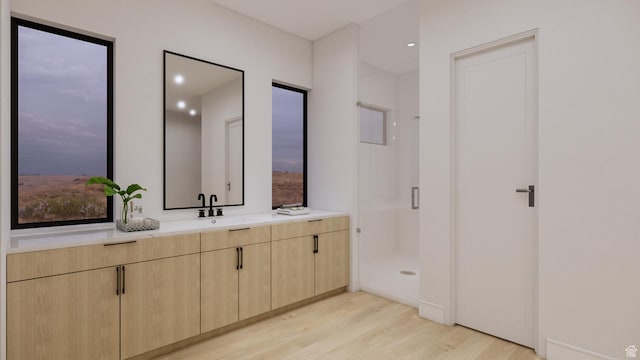 2235 Salida Del Sol, Moab, UT 84532 - bathroom with wood finished floors, a shower stall, and vanity