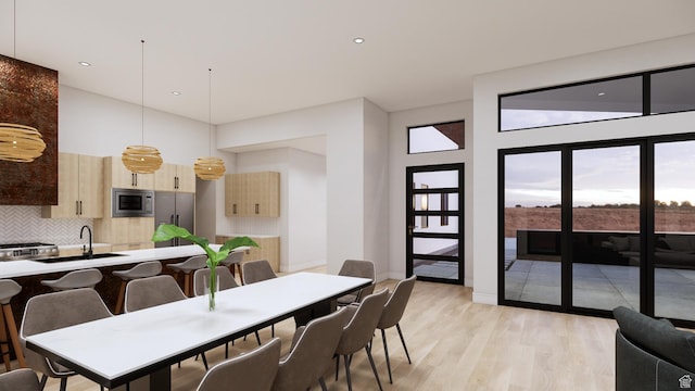 2235 Salida Del Sol, Moab, UT 84532 - dining space featuring light wood-style floors and recessed lighting