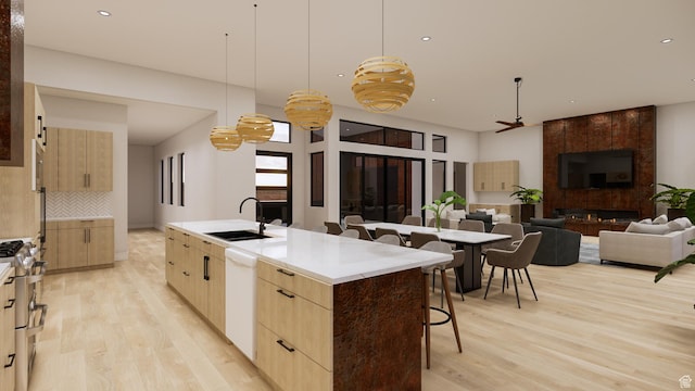 2235 Salida Del Sol, Moab, UT 84532 - kitchen featuring light brown cabinetry, light wood-style floors, modern cabinets, and recessed lighting