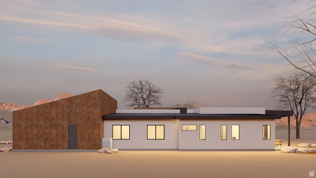 2235 Salida Del Sol, Moab, UT 84532 - view of front of house with a standing seam roof and a metal roof
