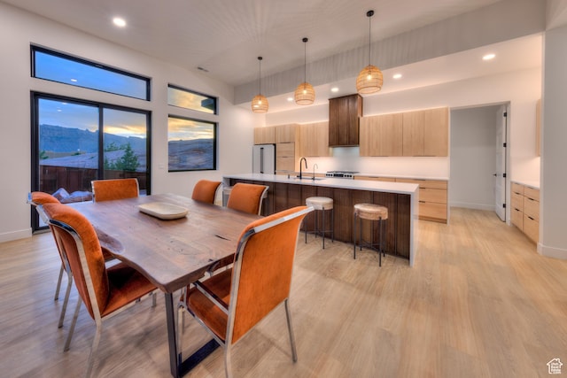 2194 Salida Del Sol, Moab, UT 84532 - dining area with baseboards, light wood-type flooring, and recessed lighting