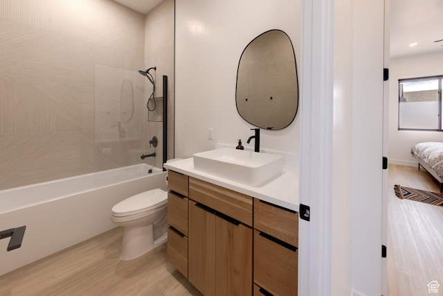 2194 Salida Del Sol, Moab, UT 84532 - ensuite bathroom featuring tub / shower combination, ensuite bathroom, vanity, toilet, and wood finished floors
