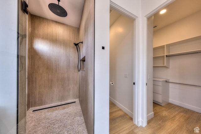 2194 Salida Del Sol, Moab, UT 84532 - full bath with a tile shower, wood finished floors, and baseboards