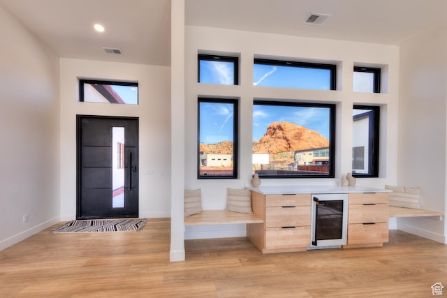 2194 Salida Del Sol, Moab, UT 84532 - entrance foyer featuring light wood-type flooring, visible vents, baseboards, and beverage cooler