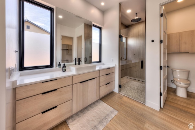 2194 Salida Del Sol, Moab, UT 84532 - bathroom with toilet, recessed lighting, a shower stall, vanity, and wood finished floors
