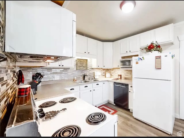 27 W 150 S, Garden City, UT 84028 - kitchen featuring white cabinets, dishwasher, white refrigerator, and light hardwood / wood-style floors