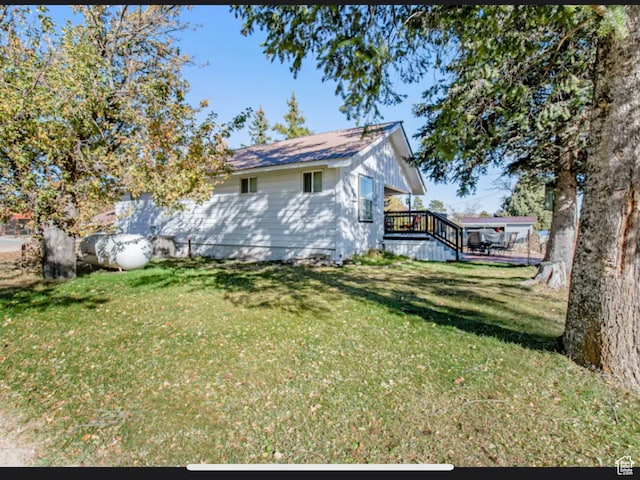 27 W 150 S, Garden City, UT 84028 - view of yard featuring a wooden deck
