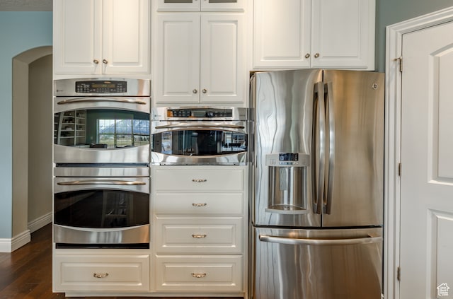 340 E Maple St, Mapleton, UT 84664 - kitchen with white cabinets, stainless steel appliances, and dark wood-type flooring