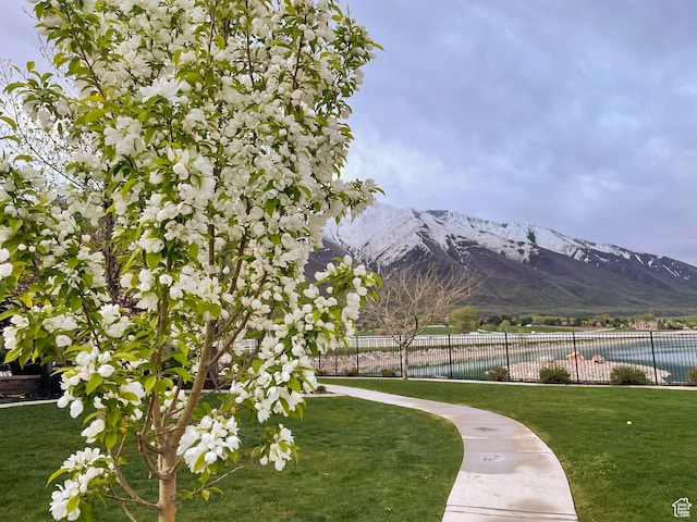 340 E Maple St, Mapleton, UT 84664 - view of home's community with a lawn and a water and mountain view
