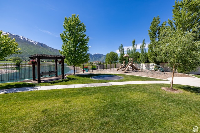 340 E Maple St, Mapleton, UT 84664 - view of home's community featuring a mountain view, a playground, and a lawn