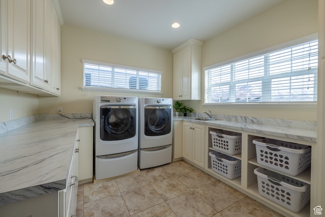 340 E Maple St, Mapleton, UT 84664 - clothes washing area featuring cabinets, washing machine and dryer, light tile patterned floors, and sink