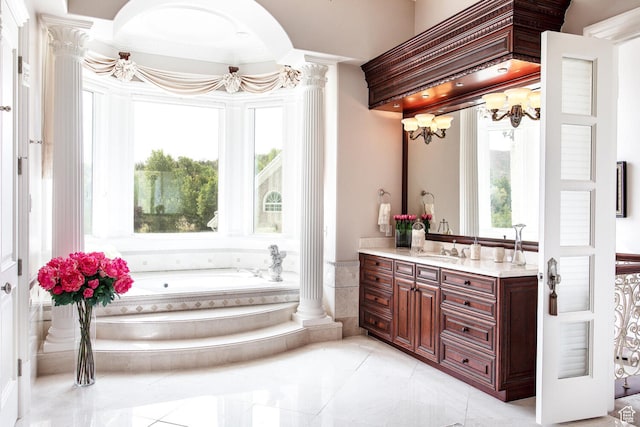 533 N Left Fork Hobble Creek Cyn, Springville, UT 84663 - bathroom featuring a relaxing tiled bath, tile floors, large vanity, and ornate columns