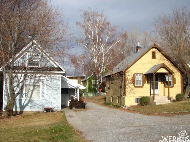 bungalow featuring a garage