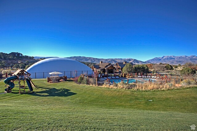 1905 E Kings Peak Cir, Heber City, UT 84032 - exterior space featuring fence, a mountain view, and playground community