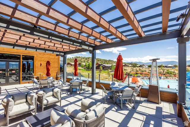 1905 E Kings Peak Cir, Heber City, UT 84032 - view of patio with outdoor dining space, a mountain view, and a pergola