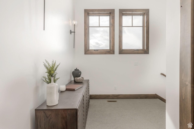 1905 E Kings Peak Cir, Heber City, UT 84032 - hallway with light carpet, visible vents, and baseboards
