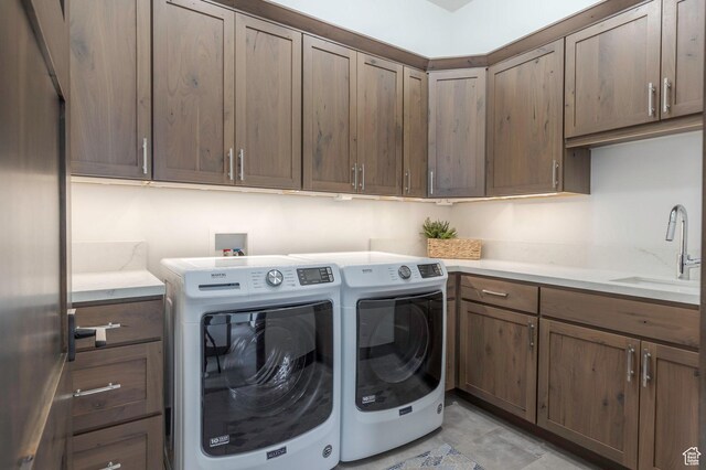 1905 E Kings Peak Cir, Heber City, UT 84032 - clothes washing area with a sink, cabinet space, and washer and dryer