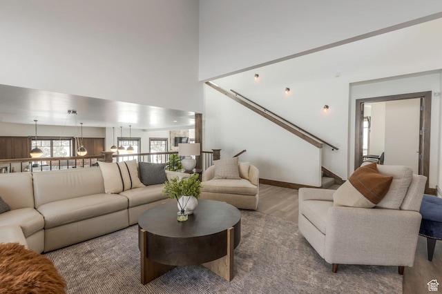 1905 E Kings Peak Cir, Heber City, UT 84032 - living area featuring wood finished floors and a towering ceiling
