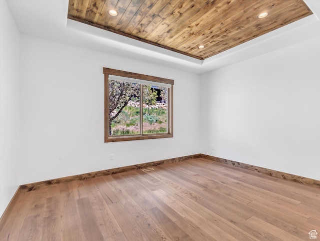 1707 E Kings Peak Cir N, Heber City, UT 84032 - spare room with a tray ceiling, wood ceiling, wood-type flooring, and recessed lighting