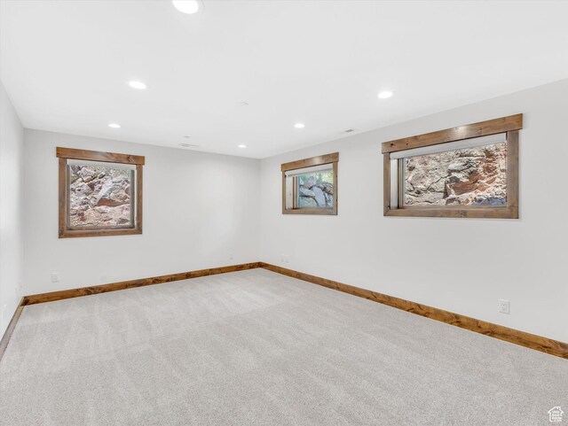 1707 E Kings Peak Cir N, Heber City, UT 84032 - carpeted empty room featuring baseboards and recessed lighting