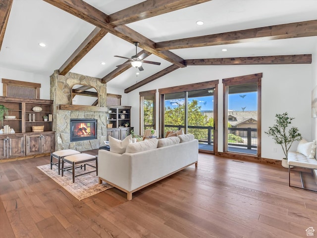 1707 E Kings Peak Cir N, Heber City, UT 84032 - living area with hardwood / wood-style floors, a fireplace, ceiling fan, and recessed lighting