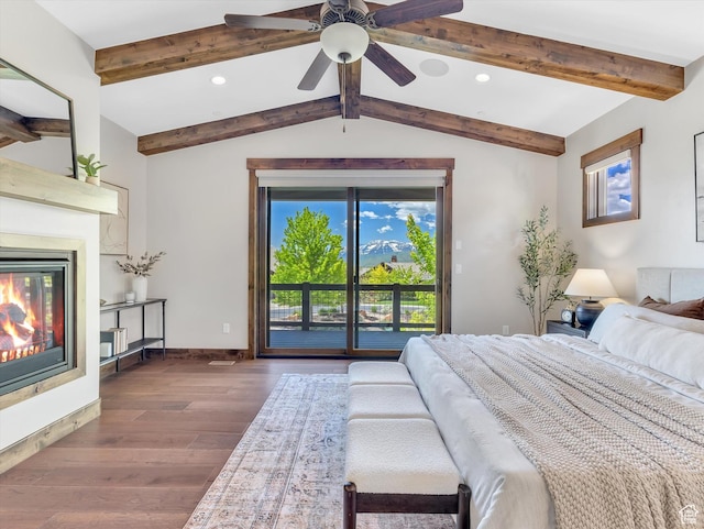 1707 E Kings Peak Cir N, Heber City, UT 84032 - bedroom with dark wood-style flooring, access to outside, recessed lighting, a glass covered fireplace, and ceiling fan