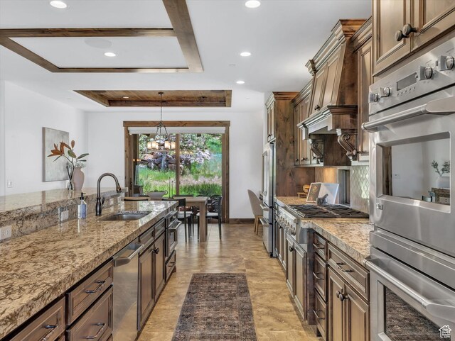 1707 E Kings Peak Cir N, Heber City, UT 84032 - kitchen featuring stainless steel appliances, recessed lighting, a chandelier, light stone counters, and pendant lighting