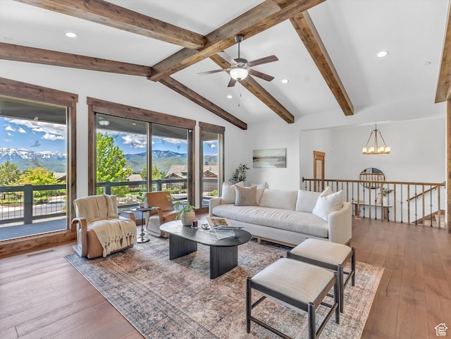 1707 E Kings Peak Cir N, Heber City, UT 84032 - living area with hardwood / wood-style flooring, a ceiling fan, a chandelier, recessed lighting, and a mountain view