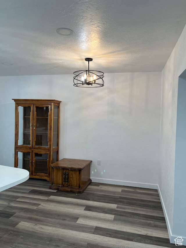 55 E 200 S, Ephraim, UT 84627 - spare room with dark wood-type flooring and a textured ceiling