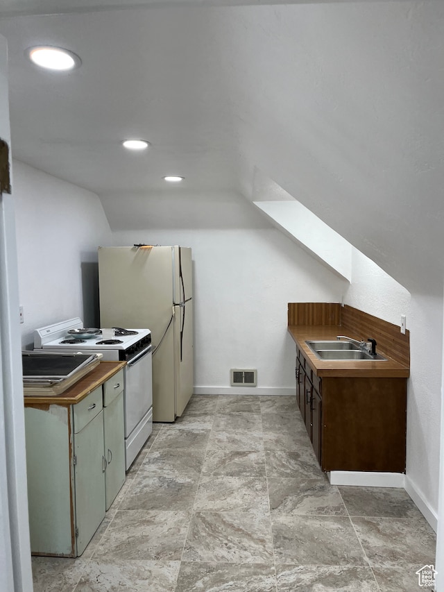 55 E 200 S, Ephraim, UT 84627 - kitchen featuring sink, white appliances, lofted ceiling with skylight, and light tile flooring