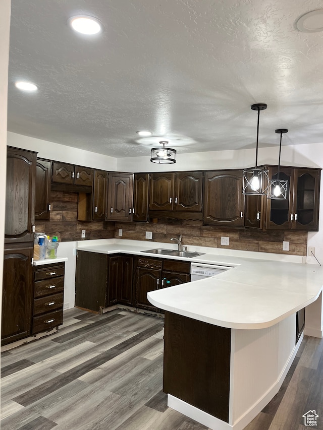 55 E 200 S, Ephraim, UT 84627 - kitchen with dark brown cabinetry, dark hardwood / wood-style flooring, sink, and decorative light fixtures