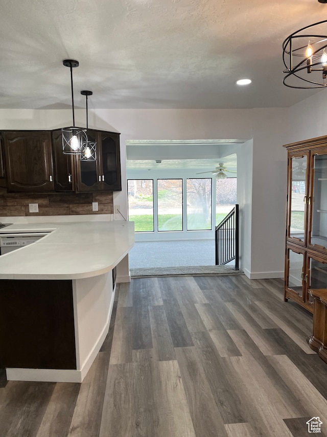 55 E 200 S, Ephraim, UT 84627 - kitchen featuring hanging light fixtures, dark wood-type flooring, white dishwasher, a notable chandelier, and dark brown cabinetry
