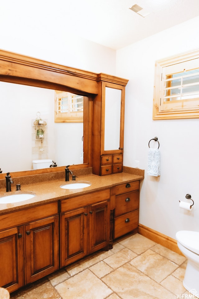 493 N 12500 W, Bluebell, UT 84007 - bathroom featuring toilet, tile floors, and double vanity