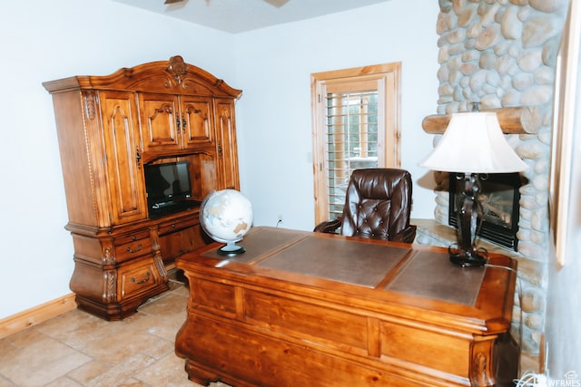 493 N 12500 W, Bluebell, UT 84007 - tiled home office with ceiling fan and a stone fireplace